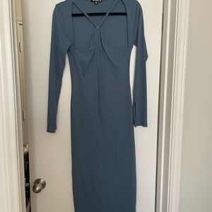 Long sleeve dress. Very flattering. Enhances curves
